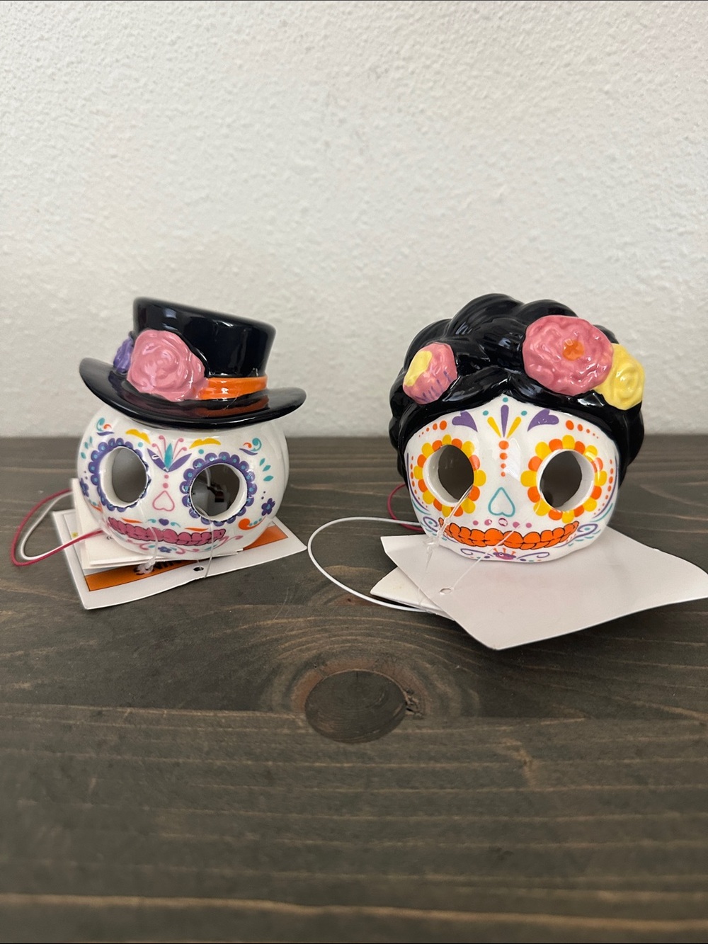 Decorative Day of the Dead Ceramic Skull Pair - Black and Pink Accents